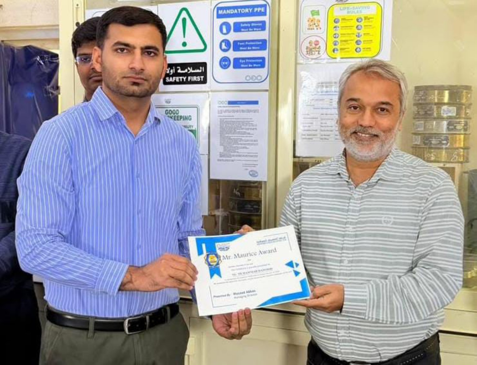 Muhammad Dawood receiving the Mr. Maurice Award
